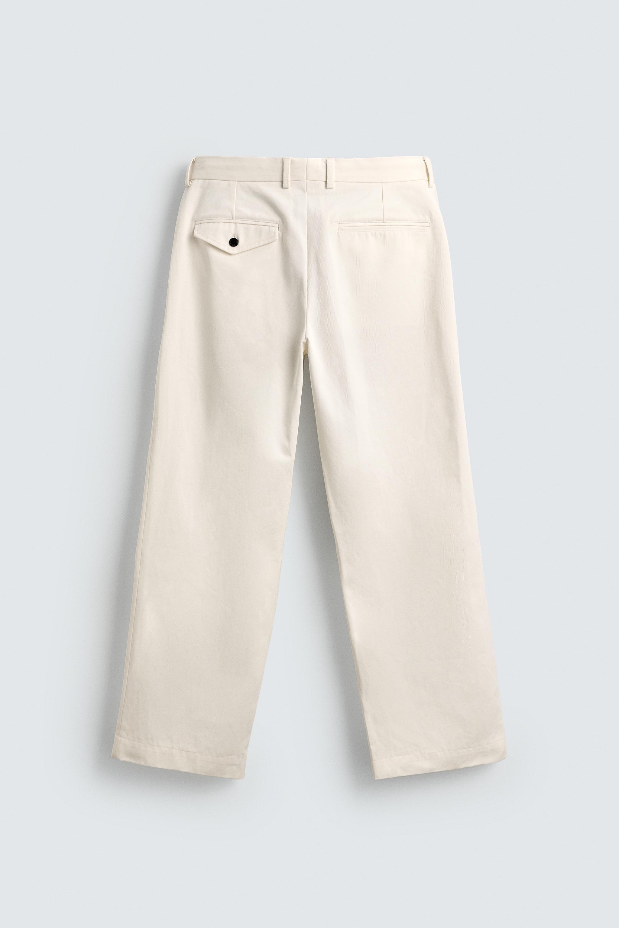 PANTALON CHINO À PLIS AARON LEVINE X ZARA